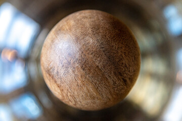 Top, above of a glass bottle with a wooden cork with an abstract aerial view. 