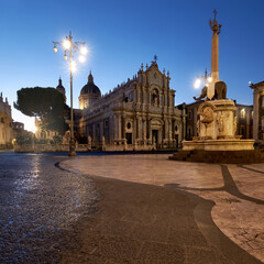 Wall Mural - Illuminated Piazza Duomo, Catania, Sicily, Italy in the evening. Cathedral of Santa Agatha and Liotru, symbol of Catania in the evening