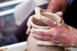 © O.PASH - Potter's hands . ceramic ware of clay. pottery