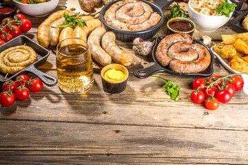 Wall Mural - Assortment of different fried sausages. Set with various meat Bavarian, Frankfurt, German grilled sausages, Oktoberfest or summer BBQ party concept, old wooden background copy space top view