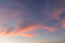 Orange Clouds On Blue Sky At Sunrise Time.
