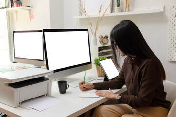 Close-up view of young ui development team working together in office.
