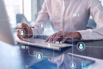 Wall Mural - hr woman specialist is typing the keyboard in the internet to find the best candidates to create int