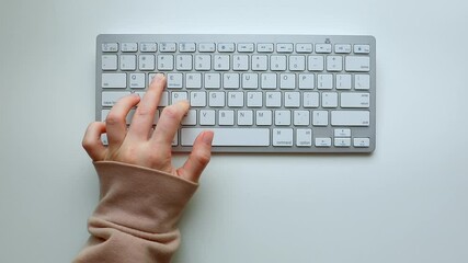 woman using one hand gaming on keyboard