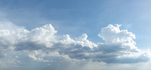 Wall Mural - blue sky background with tiny clouds. panorama white fluffy clouds in the blue sky.beautiful vast bl
