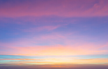 Wall Mural - beautiful sky painted by the sun leaving bright golden shades.dense clouds in twilight sky in winter