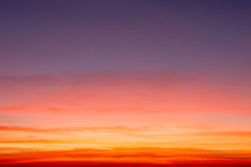 Wall Mural - beautiful sky painted by the sun leaving bright golden shades.dense clouds in twilight sky in winter