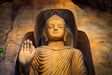 Large Stone Statue Of Buddha In A Cave In Wat Saket Golden Mountain Temple Famous Landmark In Bangkok, Thailand.