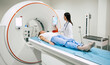 © My Ocean studio - Professional Doctor Radiologist In Medical Laboratory Controls magnetic resonance imaging or computed tomography or PET Scan with Female Patient Undergoing Procedure.