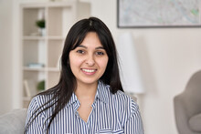 Close Up Portrait Of Young Happy Indian Business Woman Looking At Camera At Home Office. Eastern Confident Male Professional, Smiling Female Student, Millennial Adult Ethnic Lady Face Headshot.
