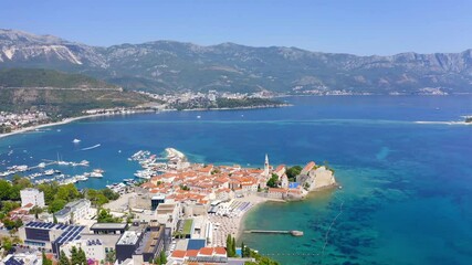 Wall Mural - Aerial view of Budva, the old city (stari grad) of Budva, Montenegro. Jagged coast on the Adriatic Sea.	