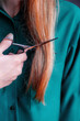 © raddmilla - Procedure of cutting long red hair