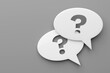 © Kuzmick - Two speech bubbles with question mark. 3D rendering.