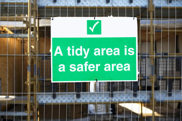 Wall Mural - A tidy area is a safe area construction. site safety sign