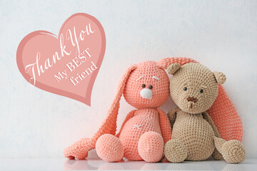 Cuddly toys on white background. Friendship Day celebration