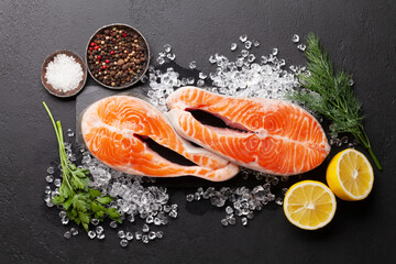 Canvas Print - Fresh raw salmon cooking. Fish steaks with herbs and spices