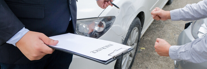 Loss Adjuster Insurance Agent Inspecting Damaged Car. .Sales manager giving advice application form document considering mortgage loan offer for car  insurance