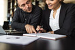 © bnenin - Two business people discussing ideas, close-up, portrait.