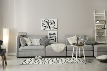 Poster - Cozy living room interior with big grey sofa