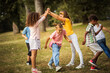 © liderina - Kids playing in schoolyard.