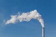 smoke get out of industrial chimney is a symbol for climate change and pollution and shows not reaching temperature goals