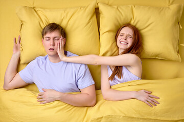 Beautiful redhead female irritated by male snoring at night, need silence