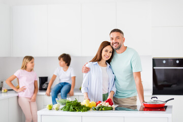 Sticker - Portrait of big cheerful family handsome guy hug charming lady toothy smile look camera have good mood indoors