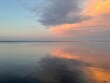© Gerri - sunset over the bay with cloud reflections onto water