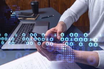hands of hr specialist browsing social networks in the internet in smart phone to find the best cand