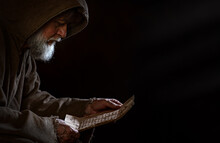 Medieval Poor Beggar Reads A Letter