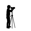 Silhouette boy teenage with photo camera