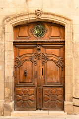 Wall Mural - Avignon, an old wooden door, typical building in the south of France
