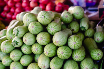 ripe zucchini in a street bazaar