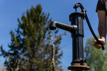  Old water pump outdoors in natural environment