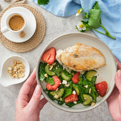 Wall Mural - Fried Chicken Breast with Fresh Strawberry Cucumber Salad.