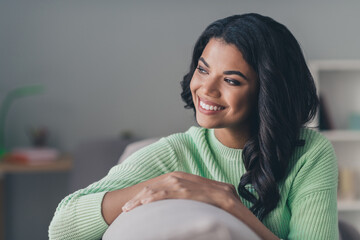 Sticker - Photo of young cheerful girl happy positive toothy smile dream dreamy look empty space enjoy morning coffee cozy sit couch indoors