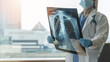 Lung disease, covid-19, asthma or bone cancer illness with doctor diagnosing patient’s health with radiological chest x-ray film for medical healthcare hospital service