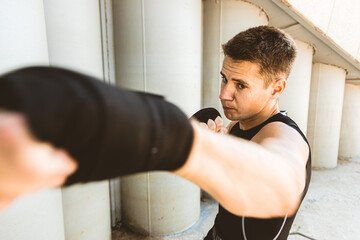 Sticker - Man exercising and fighting in outside, boxer in gloves. male boxer portrait