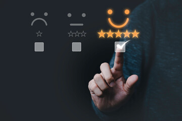 Poster - Hand touching and doing mark to select smiley face icon for evaluate product and service, customer satisfaction concept.