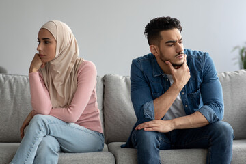 Wall Mural - Angry muslim husband and wife having quarrel at home