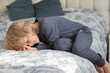 © Elena - Cute blonde boy sleeping in the bed