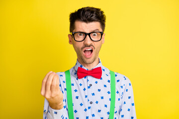 Sticker - Portrait of attractive angry guy wearing print shirt saying bad comment pretense isolated over bright yellow color background