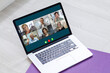 © Angelov - Virtual meeting online. Video conference by laptop. Online business meeting. On the laptop screen, people who gathered in a video conference to work on-line