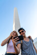 © Spectral-Design - Young couple taking selfies at an attraction of a big city
