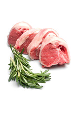 Fresh lamb loin chops on white background with green rosemary herb. Meat industry product