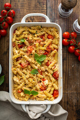 Wall Mural - Baked feta pasta with cherry tomatoes and herbs