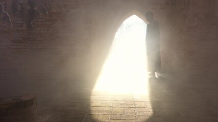 Wall Mural - Muslim man praying at an old mosque Has a smoke background in Phra Nakhon Si Ayutthaya Province, Thailand, Asian Muslims