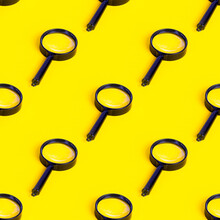 Magnifying Glass Repeat Seamless Pattern On Light Yellow Background.