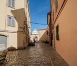 Fototapeta  - Cobblestone street in the historic heart of Rovinj