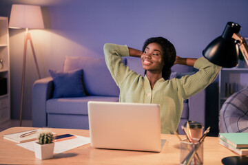 Sticker - Portrait of beautiful cheerful dreamy girl working late resting sitting in chair it project start-up profession in flat house living-room indoor